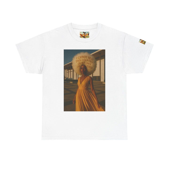 White t-shirt with a graphic of a woman in a yellow dress and text I cannot heal this country on my own on a white background